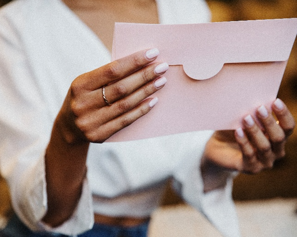 premier blog images 0008 woman holding envelope